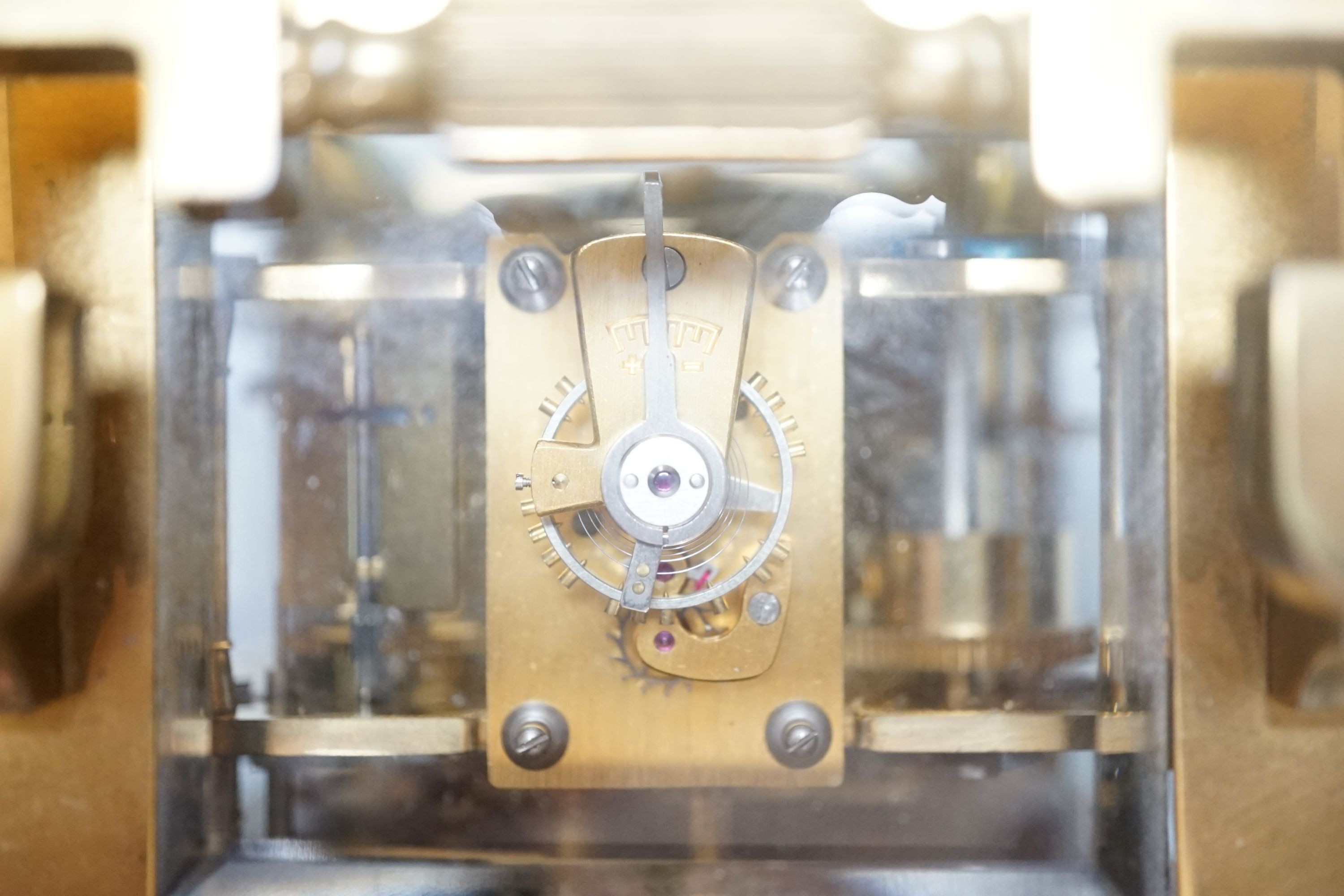 A large late 19th century brass carriage clock with alarm, and push repeat, 15 cms high.